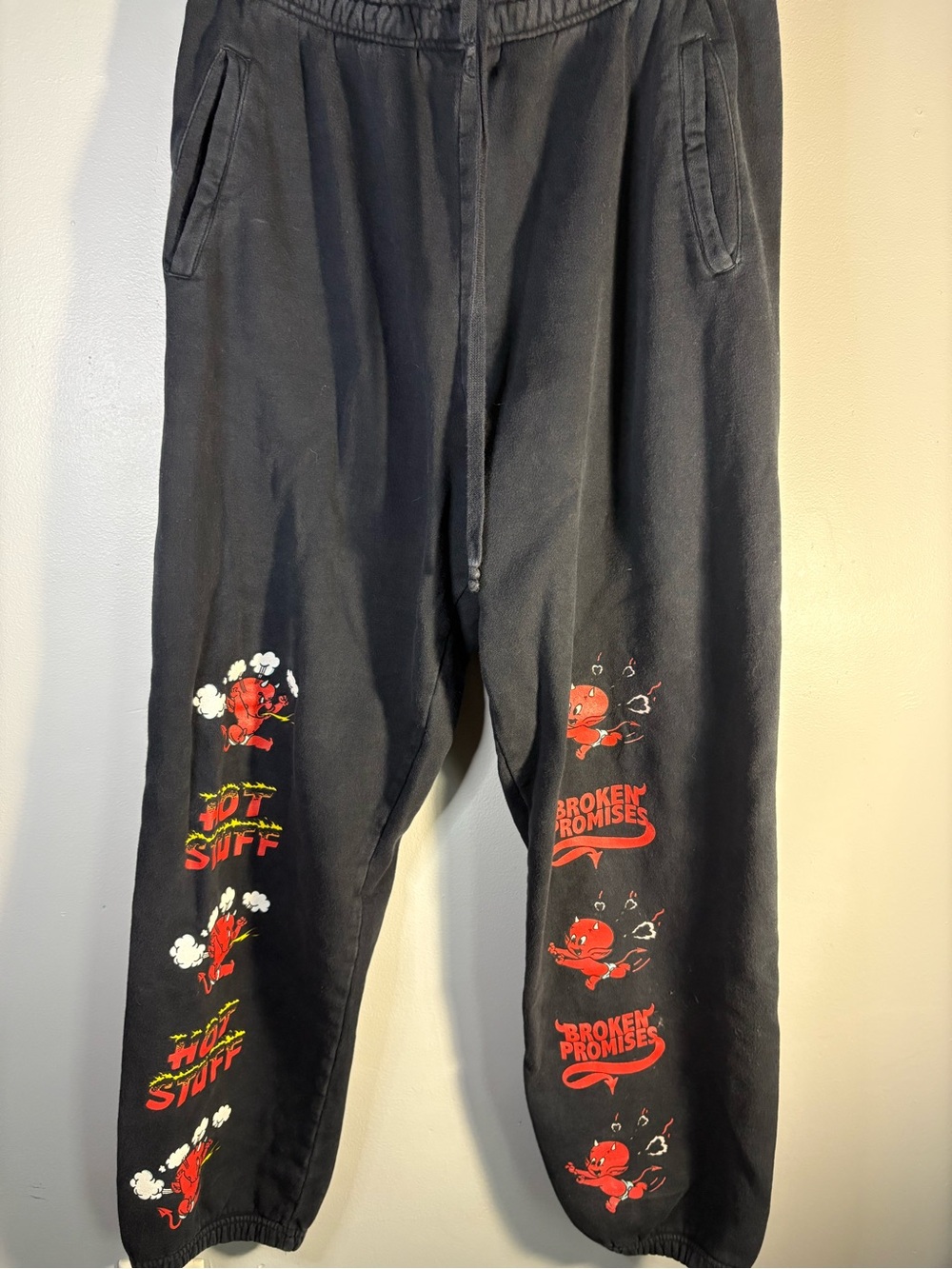 Hot Topic Black Joggers with Red Graphic Characters